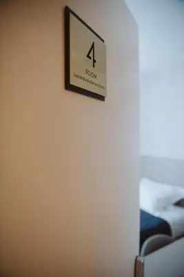 Letto o letti in una camera di Locanda Madonna di sotto