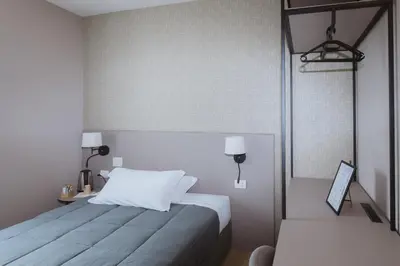 Letto o letti in una camera di Locanda Madonna di sotto