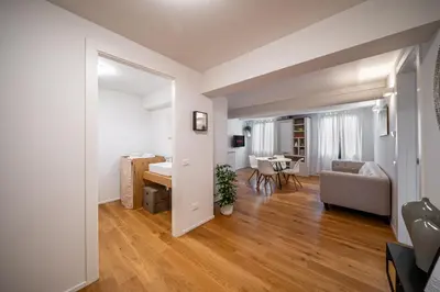Letto o letti in una camera di Appartamento LAURA - Residenze Estensi
