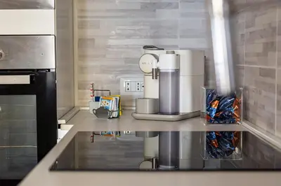 Cucina o angolo cottura di Appartamento LAURA - Residenze Estensi