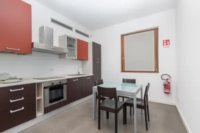 Cucina o angolo cottura di Appartamenti Torre del Capitano
