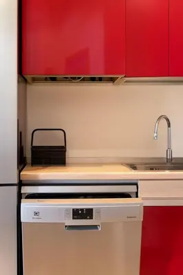 Cucina o angolo cottura di WELCOME RIVIERA-Residenza Il Glicine 5-posto auto privato riservato-20metri dal mare-wifi