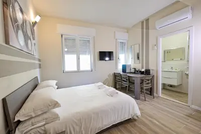 Letto o letti in una camera di City Loft