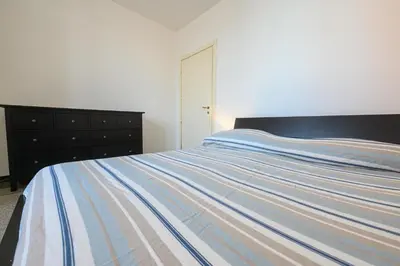 Letto o letti in una camera di 318B - Il Rifugio sul Porto, a pochi passi dal Lungomare e dal Centro di Lavagna