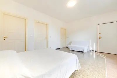 Letto o letti in una camera di 318B - Il Rifugio sul Porto, a pochi passi dal Lungomare e dal Centro di Lavagna