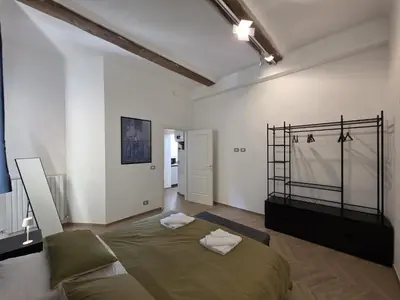 Letto o letti in una camera di MWC - Modena via Ganaceto 100