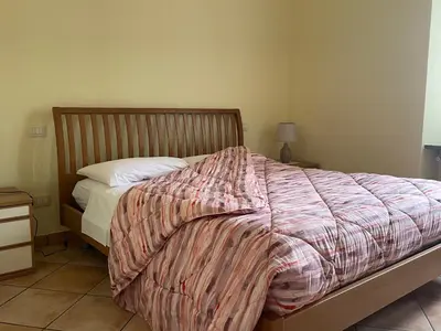 Letto o letti in una camera di Fior Di Sambuco