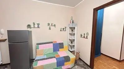 Letto o letti in una camera di Ampio bilocale a pochi passi dal centro e dalla stazione