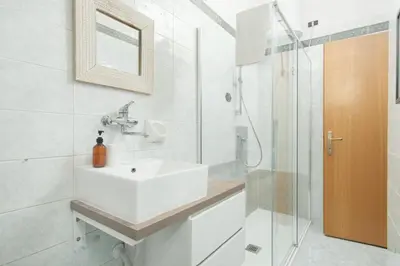 Bagno di Tra le case di Reggio - Pisacane