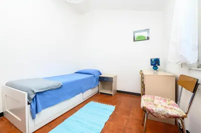 Letto o letti in una camera di 309B - Casa Mirella, Relax con vista su Mare e Natura, 7 minuti di auto dal centro e dal Mare e Spiaggia di Sestri Levante