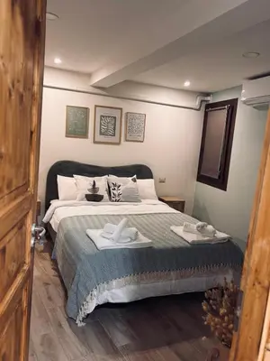 Letto o letti in una camera di B&B Note di Verdi
