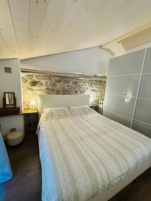 Letto o letti in una camera di Incantevole casa tra le vie di un antico borgo