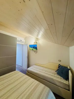 Letto o letti in una camera di Incantevole casa tra le vie di un antico borgo