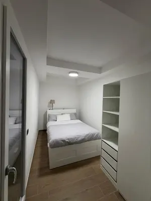 Letto o letti in una camera di Adriano Space
