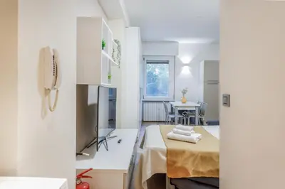 Cucina o angolo cottura di Cozy Loft - Via Emilia Est centro
