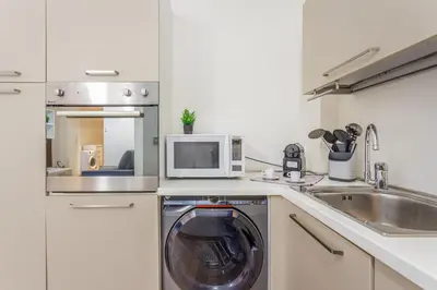 Cucina o angolo cottura di Cozy Loft - Via Emilia Est centro