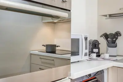 Cucina o angolo cottura di Cozy Loft - Via Emilia Est centro