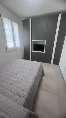 Letto o letti in una camera di Nido delle colline