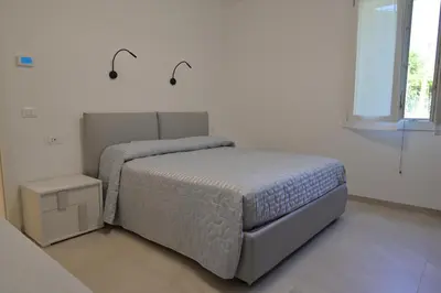 Letto o letti in una camera di Nido delle colline