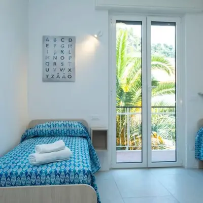Letto o letti in una camera di Mare fuori, sul lungomare con tre camere da letto e due bagni!