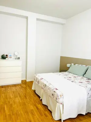 Letto o letti in una camera di Appartamento Crema centro