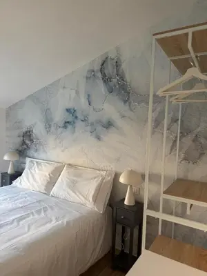 Letto o letti in una camera di Il Nido al Quinto - Dimore Damiano