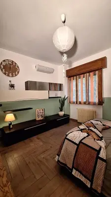 Letto o letti in una camera di Parma soggiorni brevi