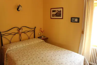 Letto o letti in una camera di Il Timone Lerta