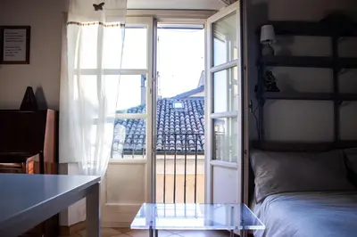 Letto o letti in una camera di Garibaldi Suite