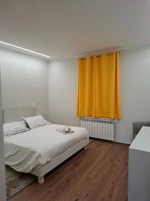 Letto o letti in una camera di Garden Lodge- GAMMA