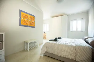 Letto o letti in una camera di Via Verdi Easy