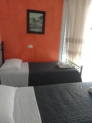 Letto o letti in una camera di B&B Vittorio