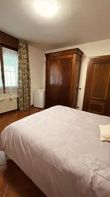 Letto o letti in una camera di Villa Marisa
