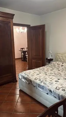 Letto o letti in una camera di Villa Marisa