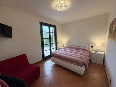 Letto o letti in una camera di Ami Affittacamere 3