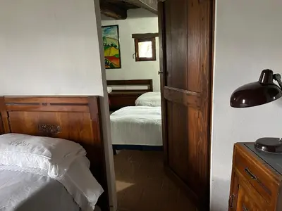 Letto o letti in una camera di B&B Il Tempo Ritrovato