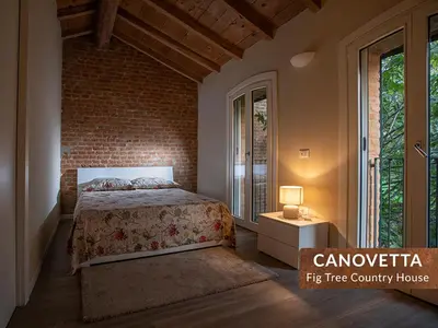 Letto o letti in una camera di Canovetta Country Houses - nearby Cremona