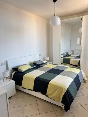 Letto o letti in una camera di Casa LIVIO