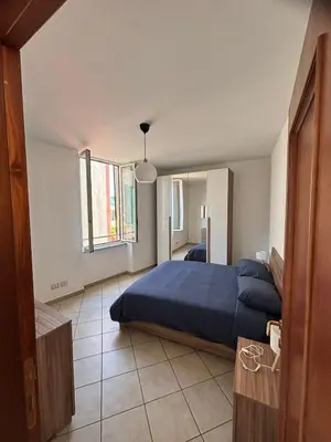 Letto o letti in una camera di Casa LIVIO