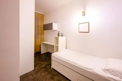 Letto o letti in una camera di Emilia Suite Edition