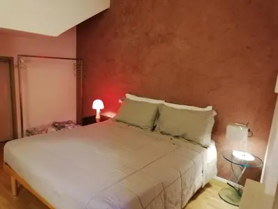 Letto o letti in una camera di Lollo Apartment