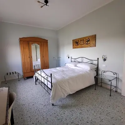 Letto o letti in una camera di B&B La Magnolia