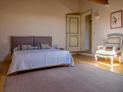Letto o letti in una camera di Penthouse in Palazzo San Donnini