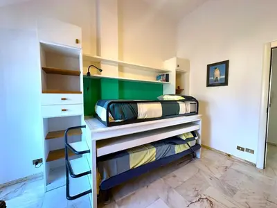 Letto o letti in una camera di Il Gabbiano - Attico con terrazze