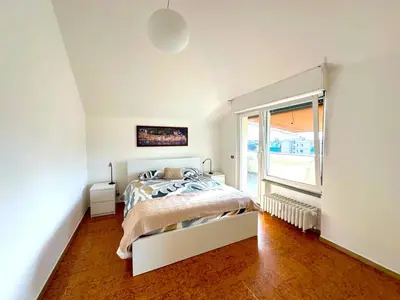 Letto o letti in una camera di Il Gabbiano - Attico con terrazze