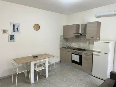 Cucina o angolo cottura di La Reggia Apartment