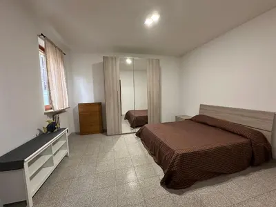 Letto o letti in una camera di La Reggia Apartment