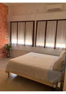 Letto o letti in una camera di Portale dei Soli 2