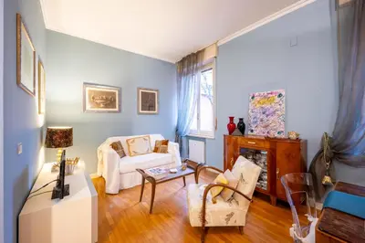 Letto o letti in una camera di B&B San Giovanni Parma
