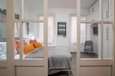 Letto o letti in una camera di Le Finestre su Via Veneto